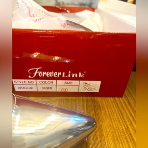 Size 8 chrome stiletto, 4 inch heel, have 2 pair